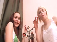 Two russian chicks playing with holes