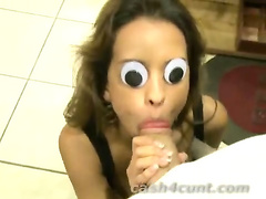 Cash buys funny blowjob from a googly eyed brunette